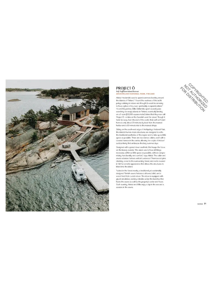 An aerial view of "Project Ö," a self-sufficient island retreat in Finland featuring two minimalist wooden cabins on a rocky shoreline with a long wooden pier and a small white boat | Twentyseven Toronto