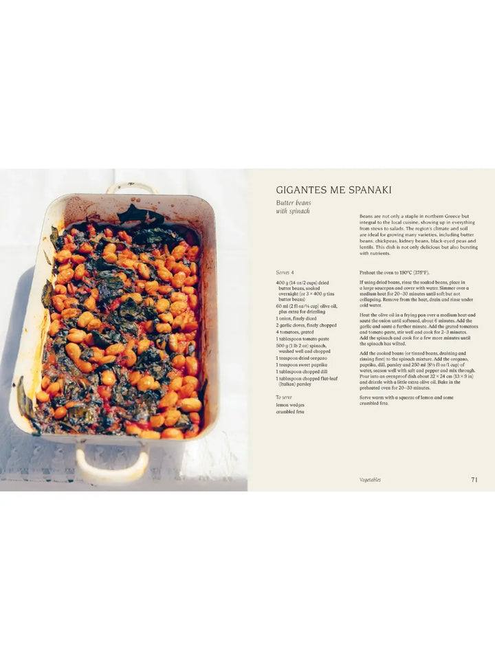 Spread from Thessaloniki: And the Many Kitchens of Northern Greece by Meni Valle for Gigantes Me Spanaki (Butter beans with spinach), featuring a large white enamel roasting pan filled with a bean and spinach stew in a tomato-based sauce | Twentyseven Toronto