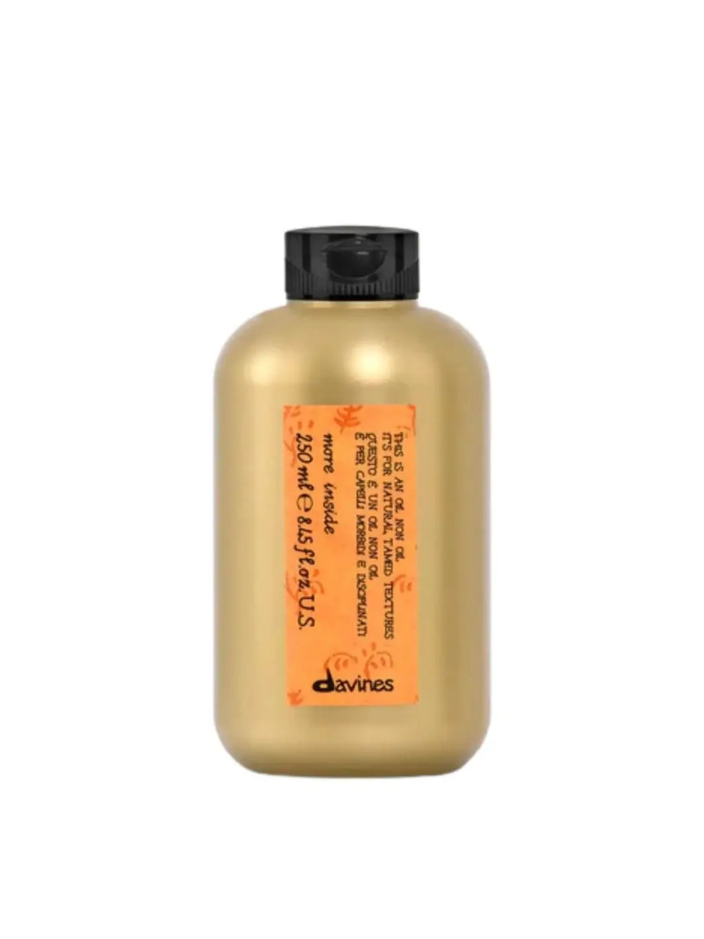 A gold plastic bottle of Davines This is an Oil non Oil featuring an orange patterned label is centered against a solid white background | Twentyseven Toronto