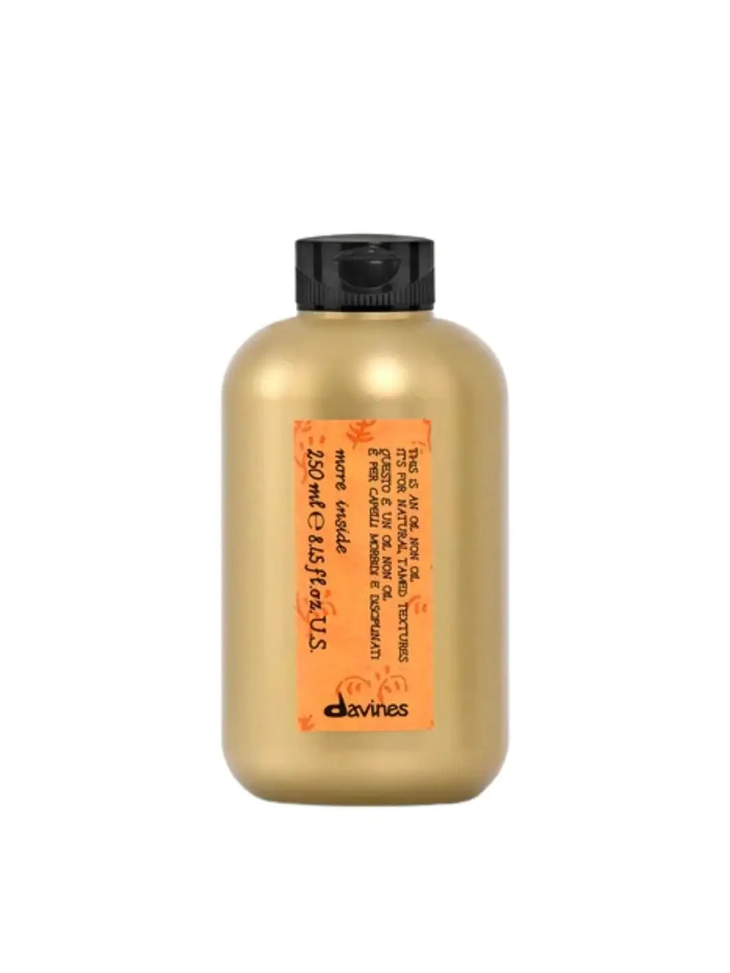 A gold plastic bottle of Davines This is an Oil non Oil featuring an orange patterned label is centered against a solid white background | Twentyseven Toronto