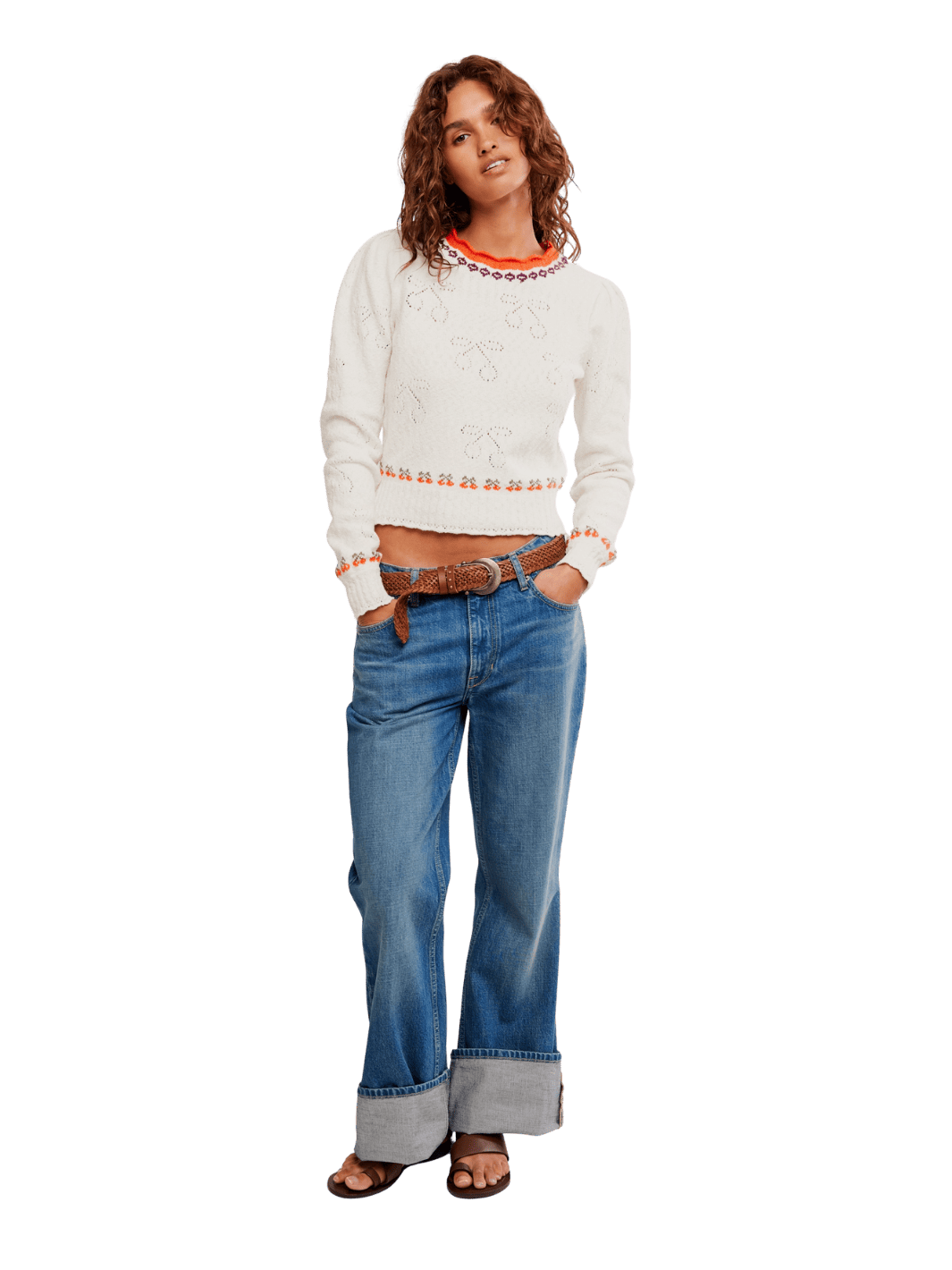 Woman wearing a white sweater from Free People Tilly Pullover in 'Coconut Milk Combo' and blue jeans | Twentyseven Toronto