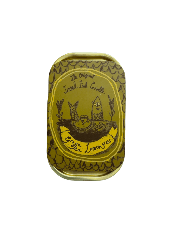 Decorative tin of Tinned Fish Candle with 'Green Tea Lemongrass' scent on a transparent background | Twentyseven Toronto