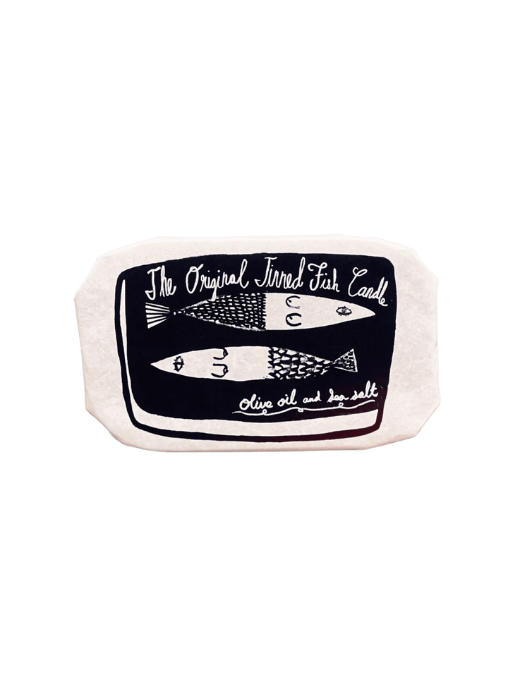 Tinned Fish Candle with tinned fish illustration and 'The Original Tinned Fish Candle' label on a transparent background | Twentyseven Toronto