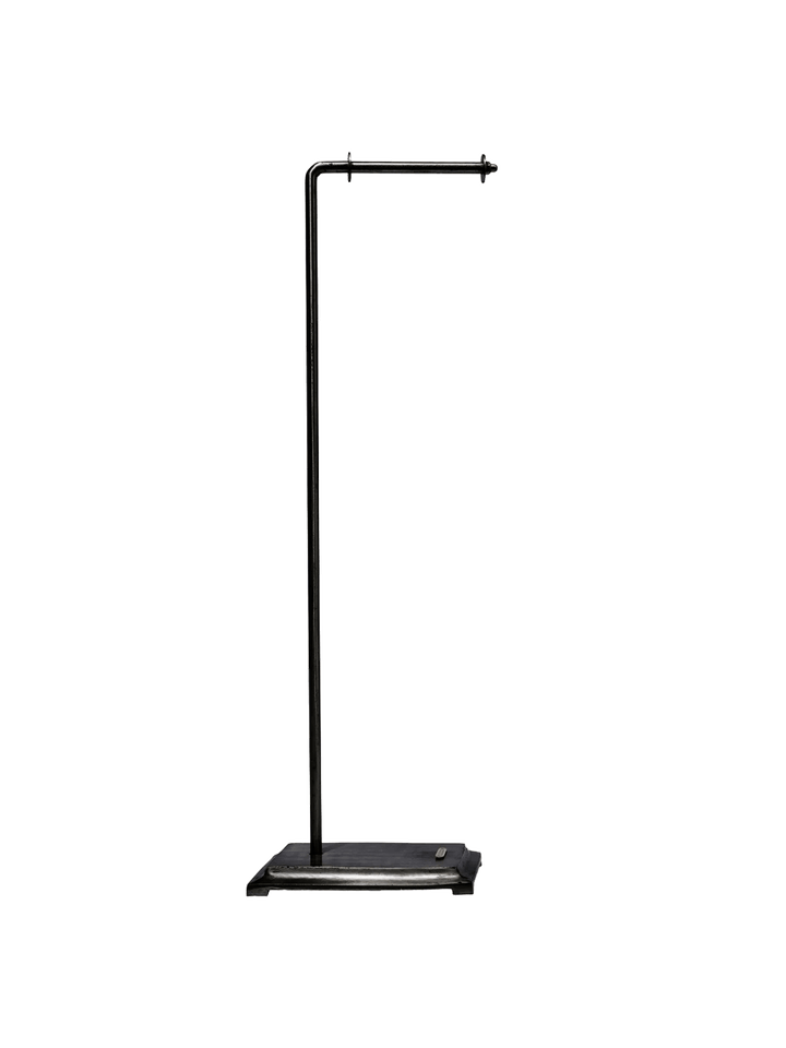 Puebco Angled Toilet Paper Holder in Black, featuring a minimalist recycled iron frame, horizontal roll holder and rectangular base against a white background | Twentyseven Toronto