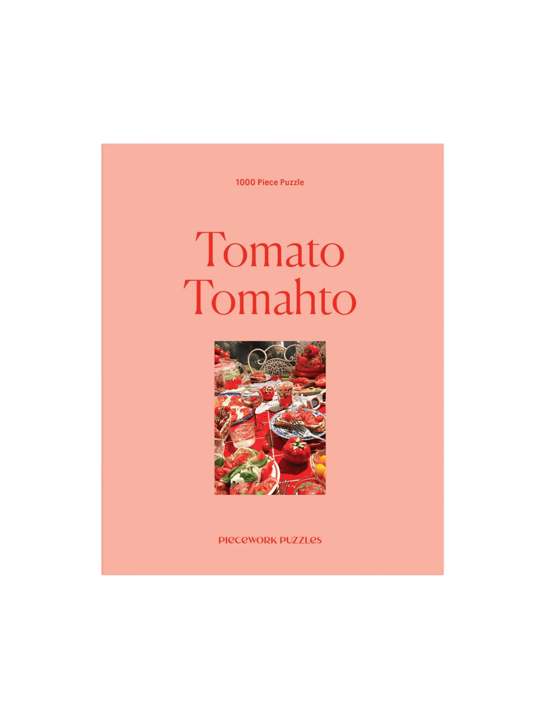 Piecework Puzzles 'Tomato Tomahto' 1000 Piece Puzzle pink and red packaging on a transparent background | Twentyseven Toronto