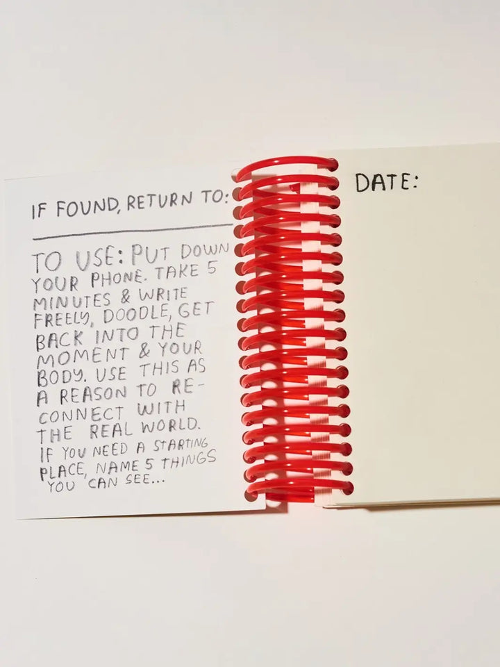 The inside page of the Unplug Journal from People I've Loved features handwritten instructions prompting the user to put down their phone and write or doodle for five minutes | Twentyseven Toronto