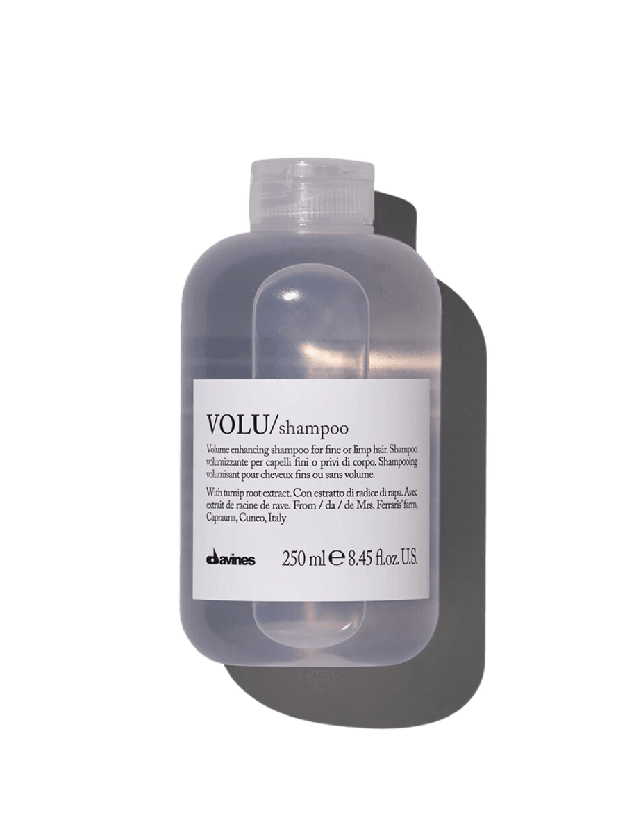 A standard 250 ml bottle of Davines VOLU Shampoo | Twentyseven Toronto