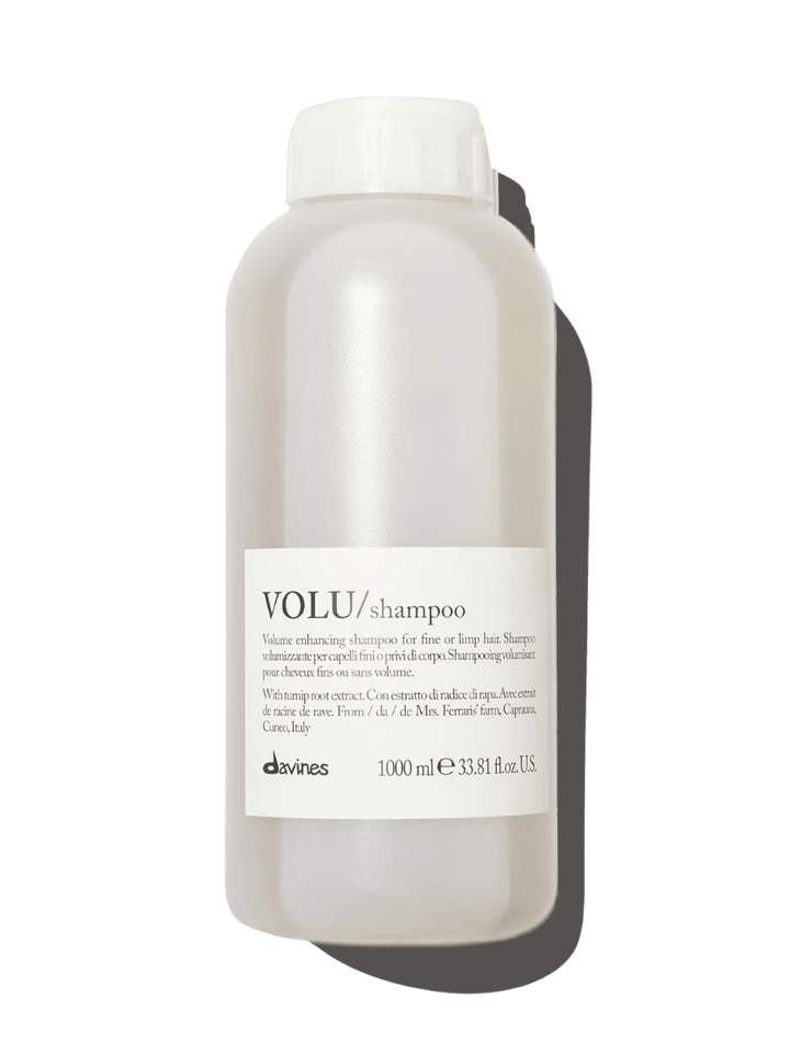A large, 1000 ml salon-size bottle of Davines VOLU Shampoo | Twentyseven Toronto