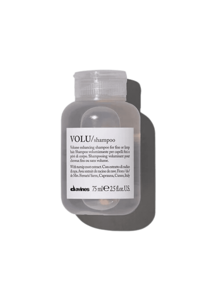 A small, 75 ml travel-size bottle of Davines VOLU Shampoo | Twentyseven Toronto