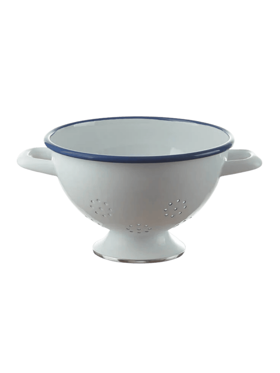 A white enamel colander featuring side handles, a blue rim, small circular drainage holes, and a raised pedestal base with a metallic rim, highlighting the Munder Email White/Blue Colander with Chrome Ring Base, 22 cm | Twentyseven Toronto