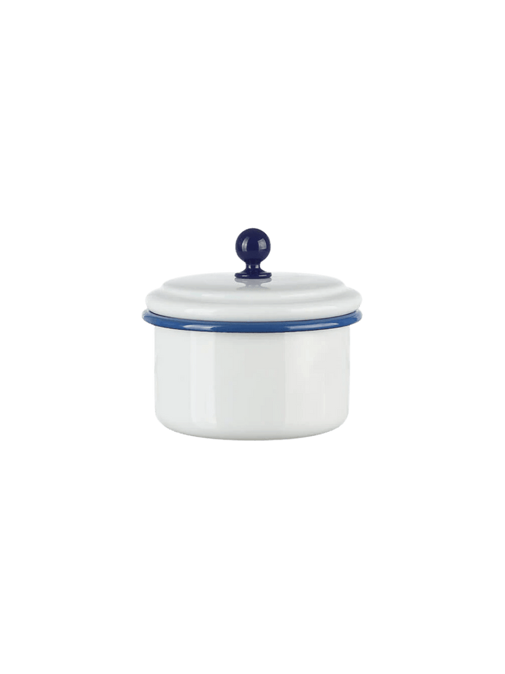 A small, round white enamel storage container featuring a dark blue rim and a matching blue spherical knob on its lid, showcasing the Munder Email White/Blue Small Storage Container | Twentyseven Toronto