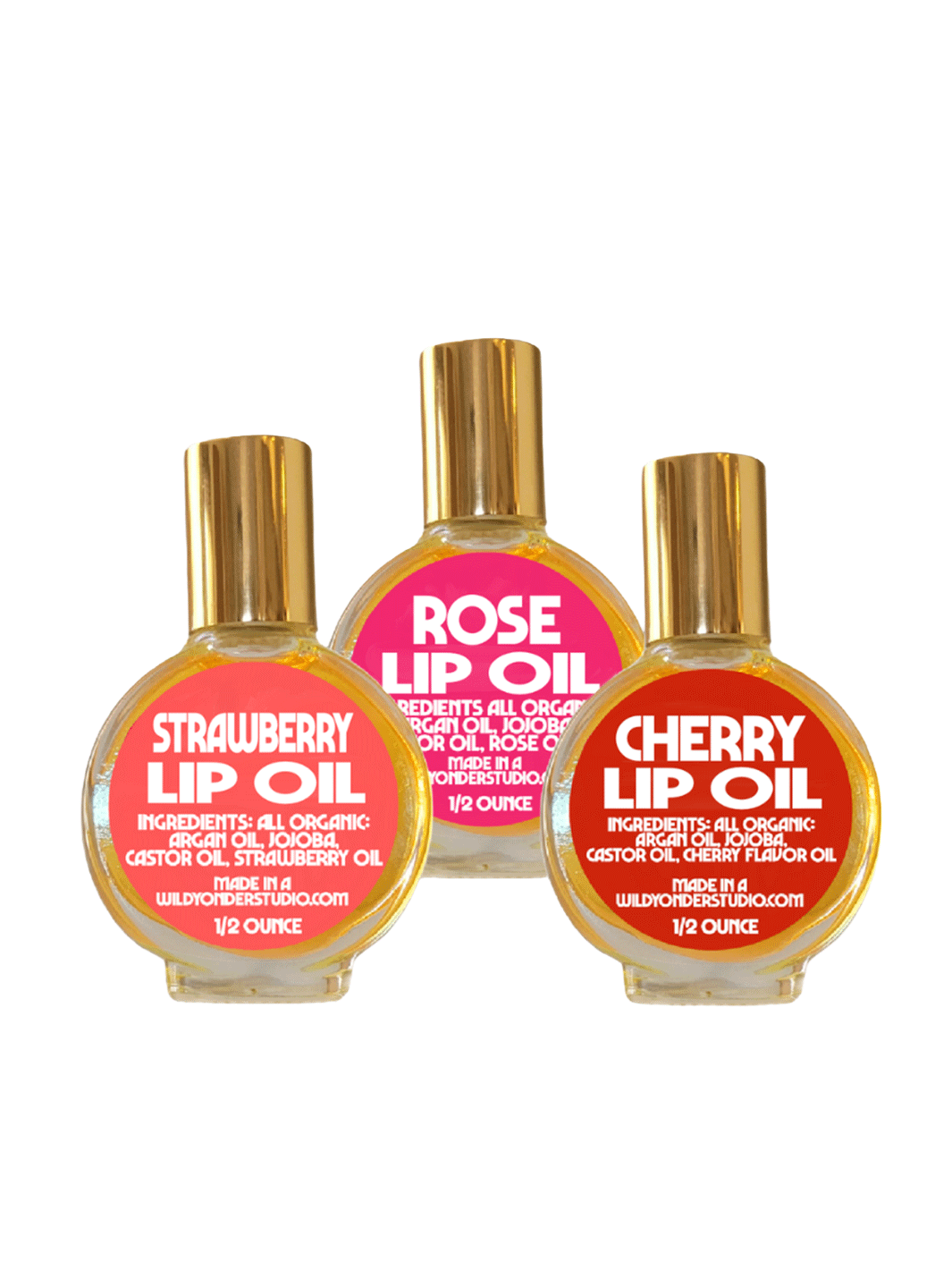 Wild Yonder Studio Lip Oils in Strawberry, Rose, and Cherry, featuring colourful labels and gold caps | Twentyseven Toronto