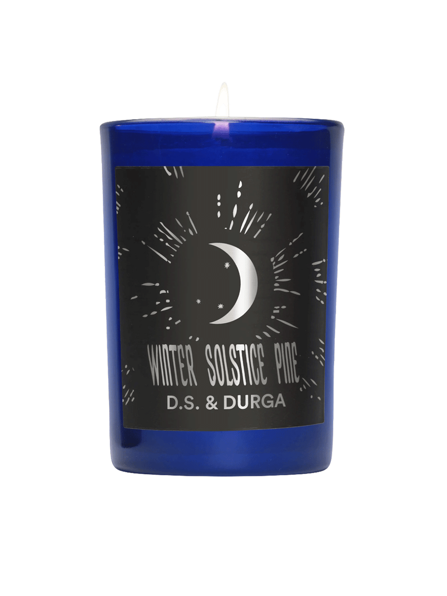 D.S. & Durga Winter Solstice Pine Candle in a cobalt blue glass vessel with a black crescent moon label | Twentyseven Toronto