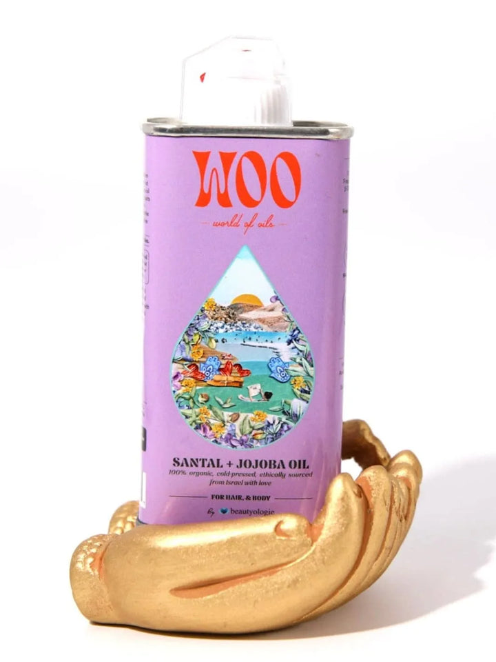 Purple tin can of WOO World of Oils Organic Santal + Jojoba Oil with a colourful label | 3.4 oz | 100 ml | Twentyseven Toronto