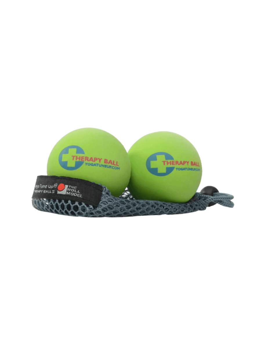 A pair of Tune Up Fitness Yoga Tune UP Therapy Balls in Green | Twentyseven Toronto