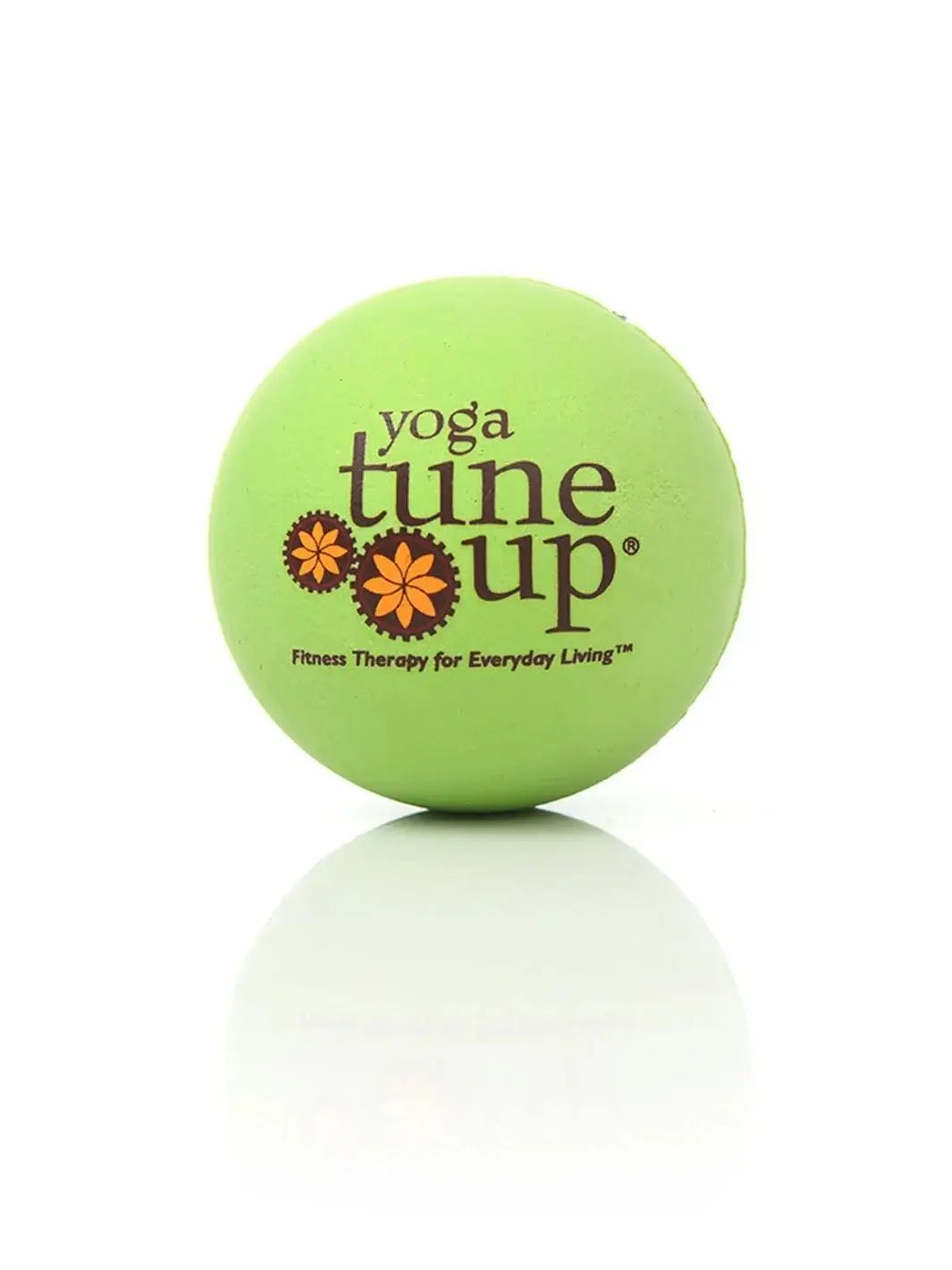 Close up of green therapy massage ball from Tune Up Fitness on a white background | Twentyseven Toronto